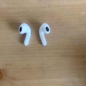 Apple AirPods. Left ear and right ear. No charging case